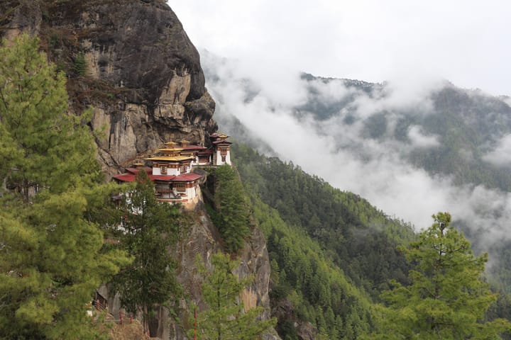 A monastery known as the "Tiger's Nest," perches on a cliffside in Bhutan.
