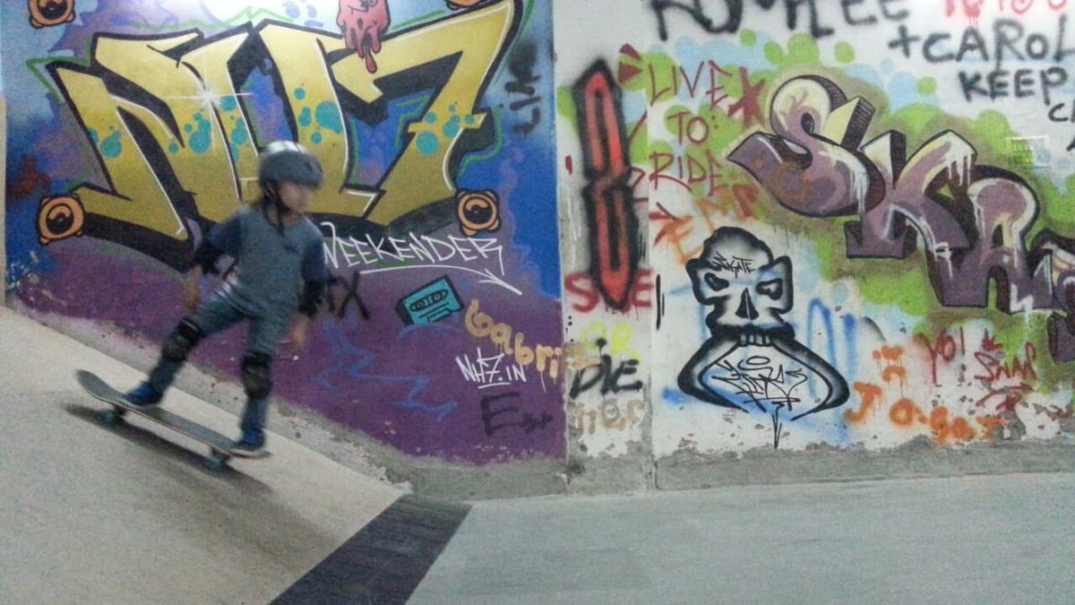 Youth learn to flip at India's first indoor wooden skateboarding park