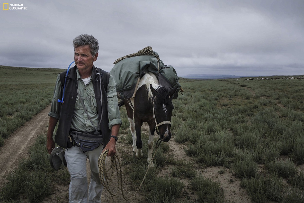 Pulitzer Prize-winning journalist and National Geographic Fellow Paul Salopek and his walking companion, Alex Moen, climbing the steppes in the Mangystau region of Kazakhstan. Join the journey at outofedenwalk.org. Photograph by John Stanmeyer / National Geographic 