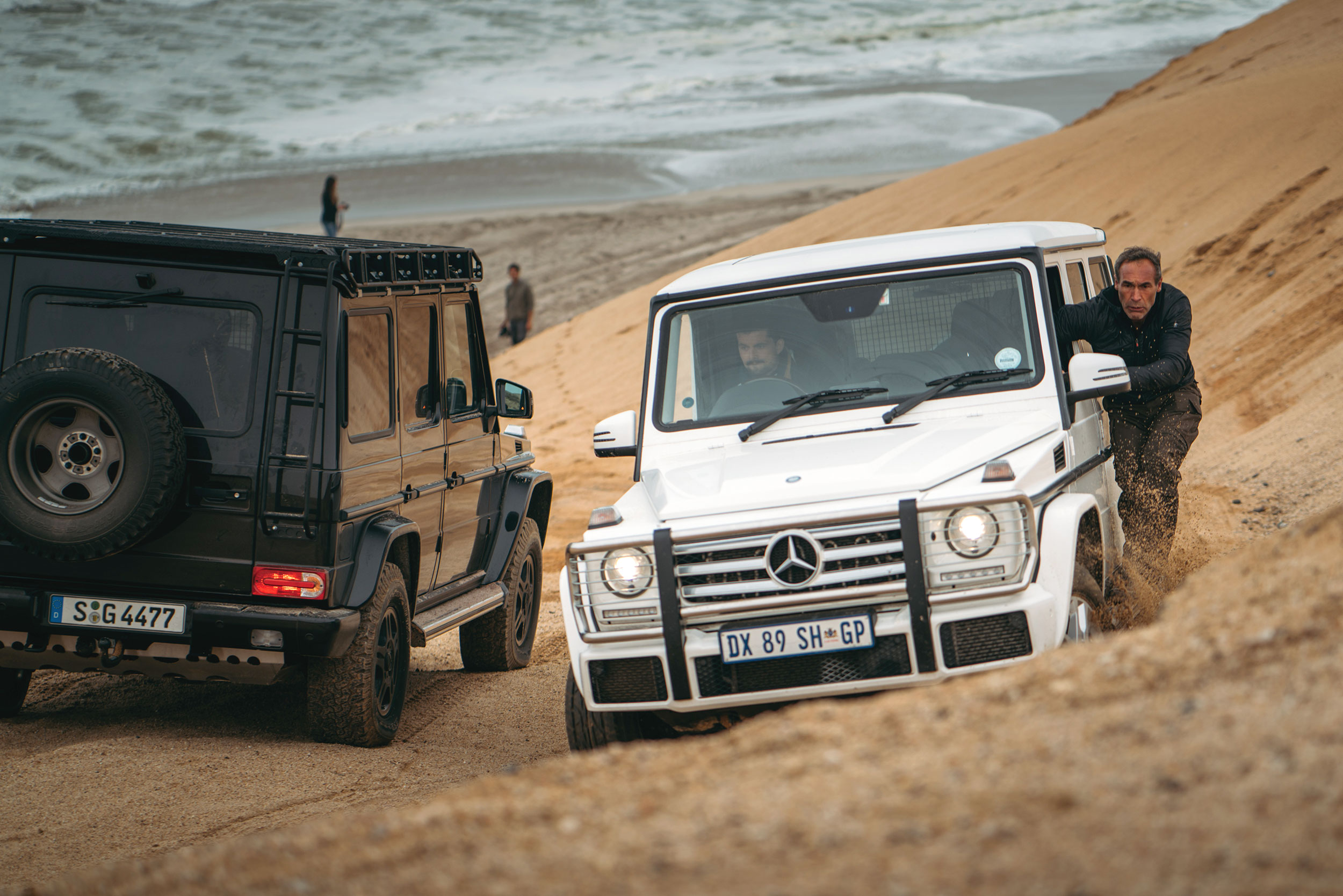 We'd barely left civilisation and were heading north on the Skeleton Coast, when the ocean down our track. Unable to maintain momentum while making the tight turn around, all the vehicles immediately got bogged down in deep sand. As the tide came in, the crew got down and dug out all the cars with their bare hands—then Mike directed us up a track through the hills back to dry land. Photo: Apoorva Prasad