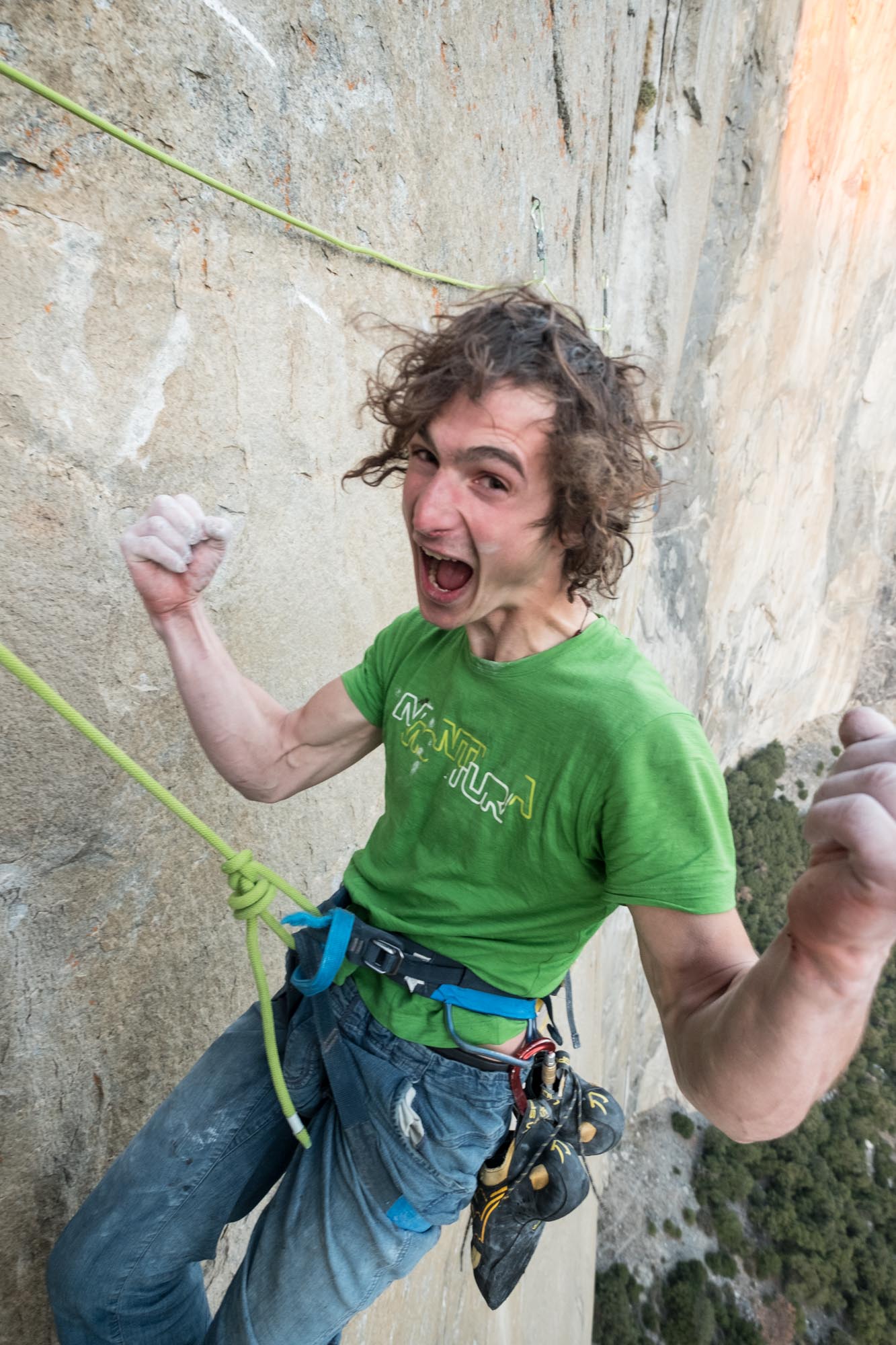 Adam Ondra celebrating after he finished the most difficult pitches of the climb. Photo Courtesy Heinz Zak/ Black Diamond Equipment