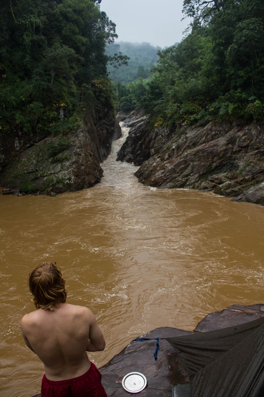 Camping just downstream of a un-navigable waterfall. Filled with enough food and camping equipment for six days, kayaks can weigh up to 30kg and must be carried on the shoulder for climbing over large boulders and up steep slopes.