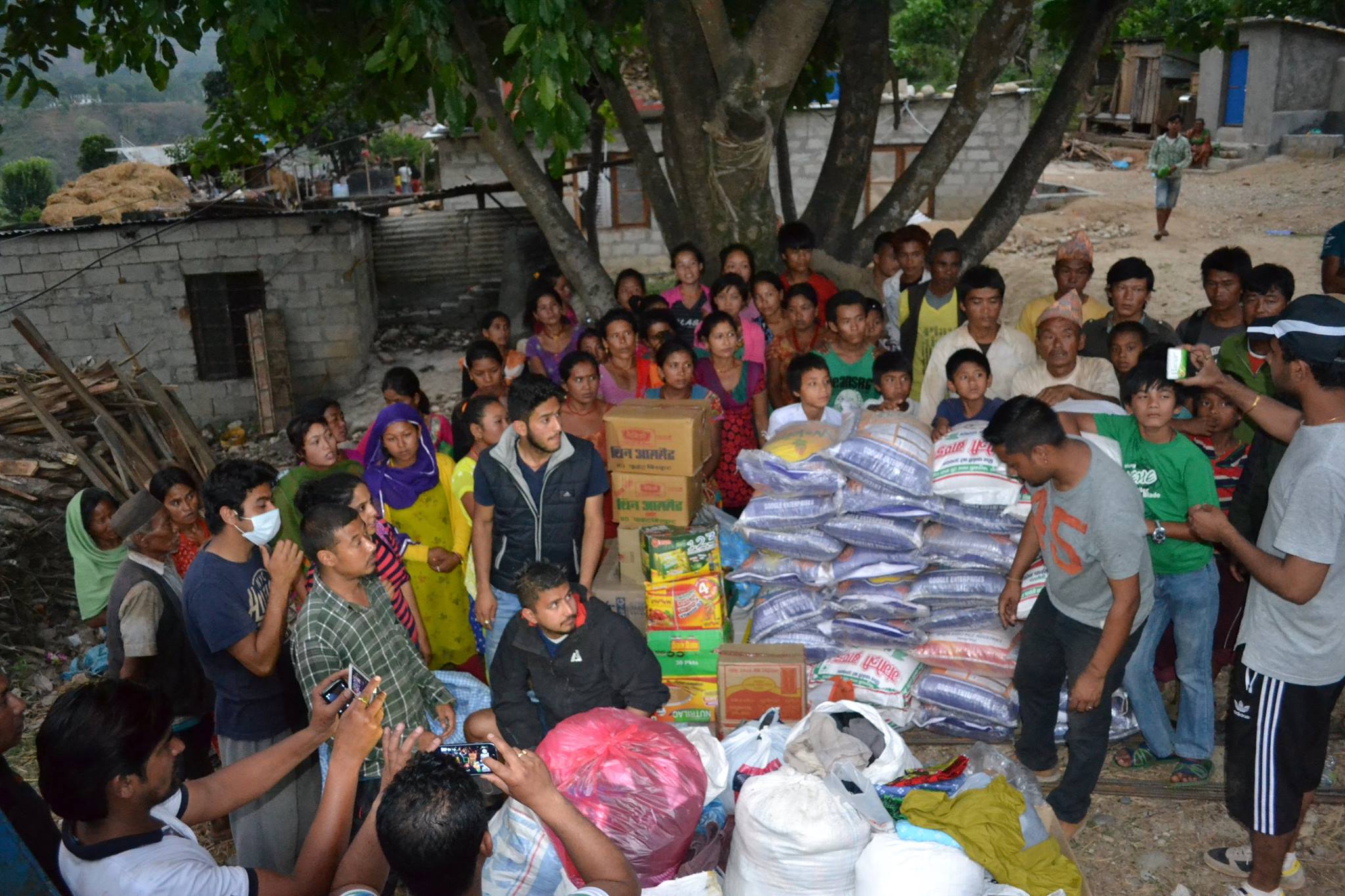 Distribution of relief material in a village in Dhading district