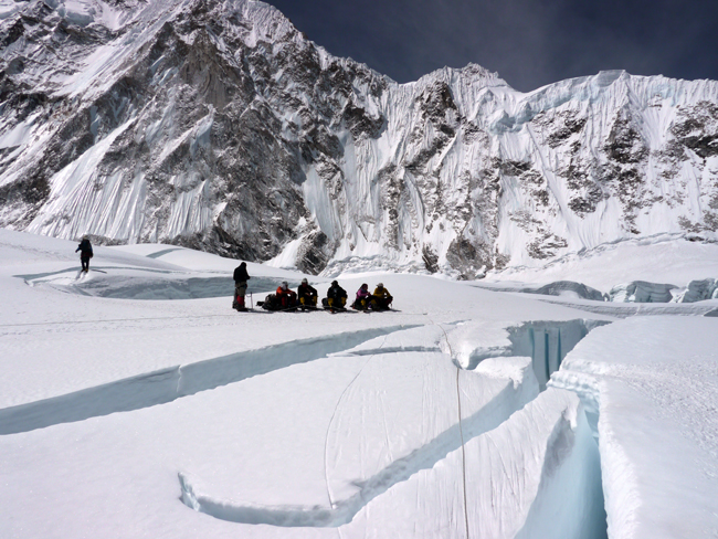 A team takes a break at the top of the Khumbu Icefall on the way to Camp I Photo Garrett Madison
