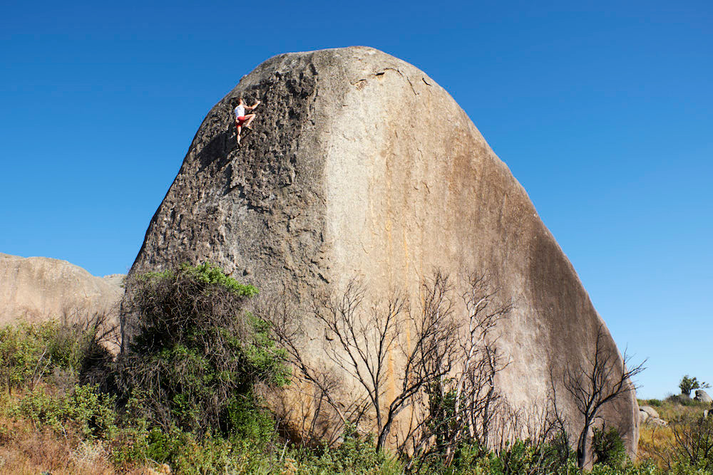 All or Nothing (V4/6C). The first solo ascent of the 50 foot boulder ‘All of Nothing.’ Paarl Mountain. RSA.