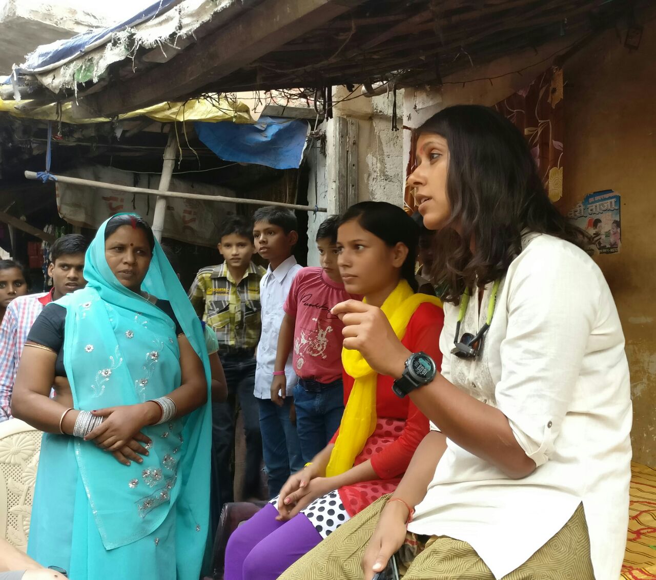 Shilpika speaks with a group of women about sanitation at WaterAid's project site in Kanpur. Photo © GangesSup