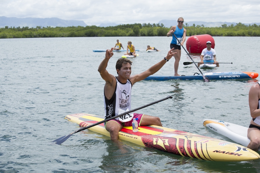 Kai Lenny passes his competition, pulling off an improbable come from behind victory for Hawaii in the Team Relay Race. Photo: ISA / Ben Reed