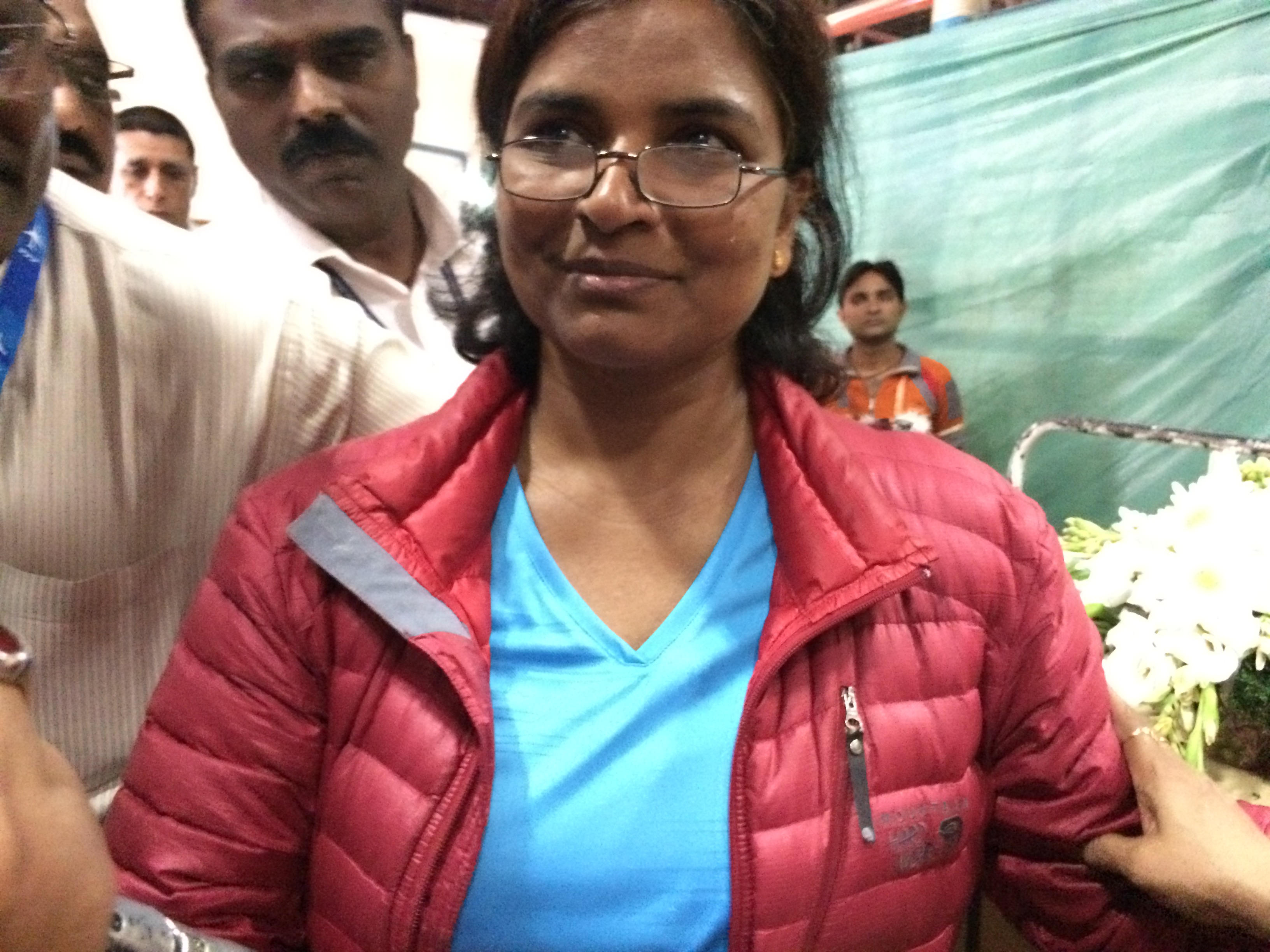 Dr. Dorasanamma, Babu's sister at the airport in his Mountain Hardware jacket