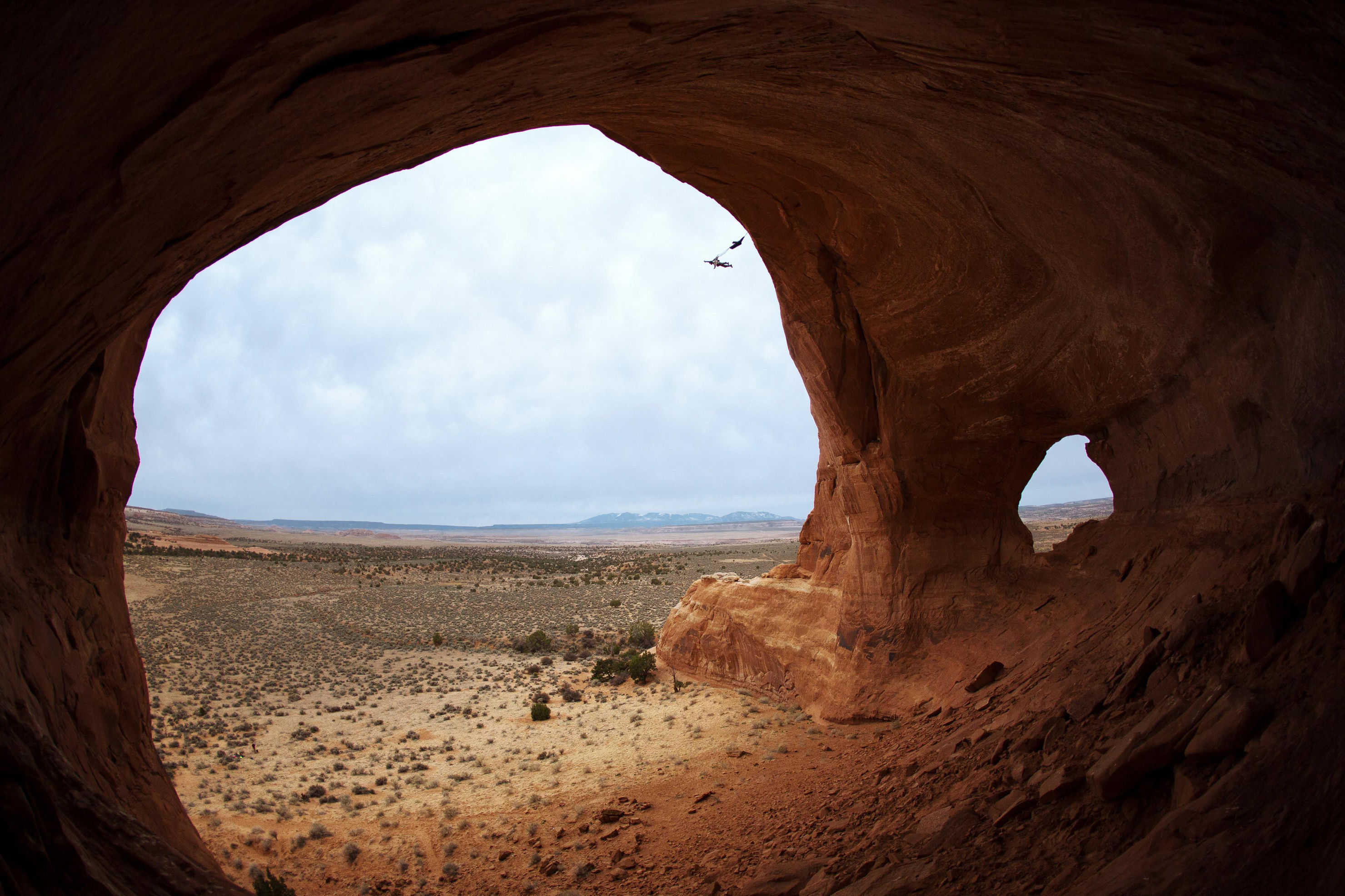 Matt Fleischman leaping from Looking Glass Arch. Photo by Krystle Wright