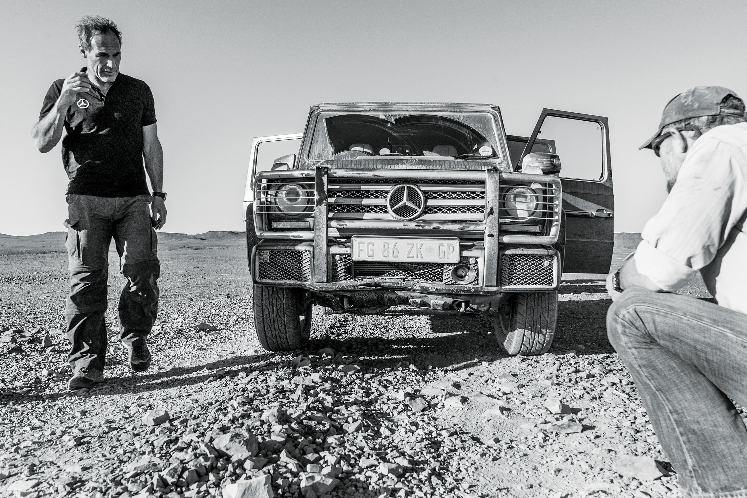 The route through the Namib desert is tough on the vehicles. One of the G-wagens hits a sudden dip in the track, denting the front bumper protecting the radiator. By this point we've already had more tire changes than we have spare tires and need to drive cautiously. Photo: Apoorva Prasad