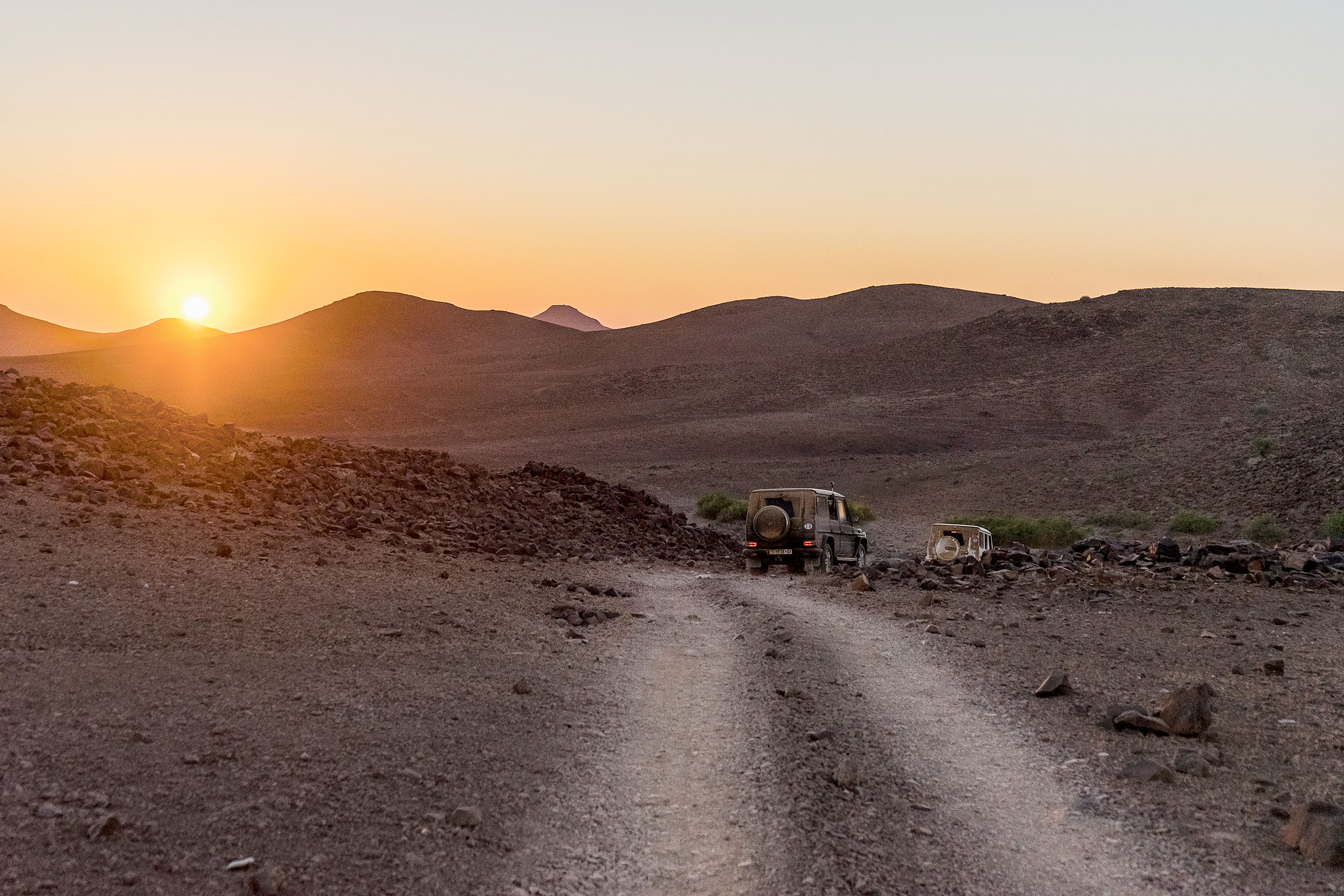 "So where are we and where are we going?" The only fixed plan was to get from Walvis Bay to Opuwo, where we've got two chartered bush planes to take us out. Mike plans the route through the desert every day as we try to get ever closer to our 1000km objective. Photo: Apoorva Prasad