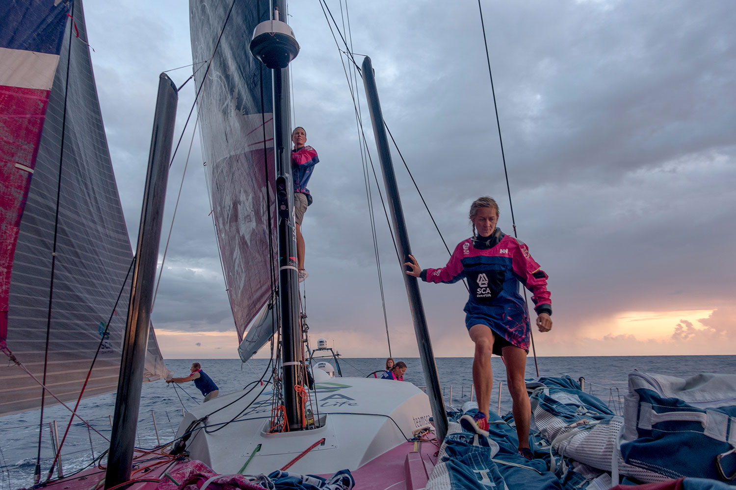 Carolijn Brouwer searches for breeze from the boom as Sophie Ciszek heads forward with her weight. Each team must have at least two "under 30" sailors. PHOTO: CORINNA HALLORAN / TEAM SCA / VOLVO OCEAN RACE 