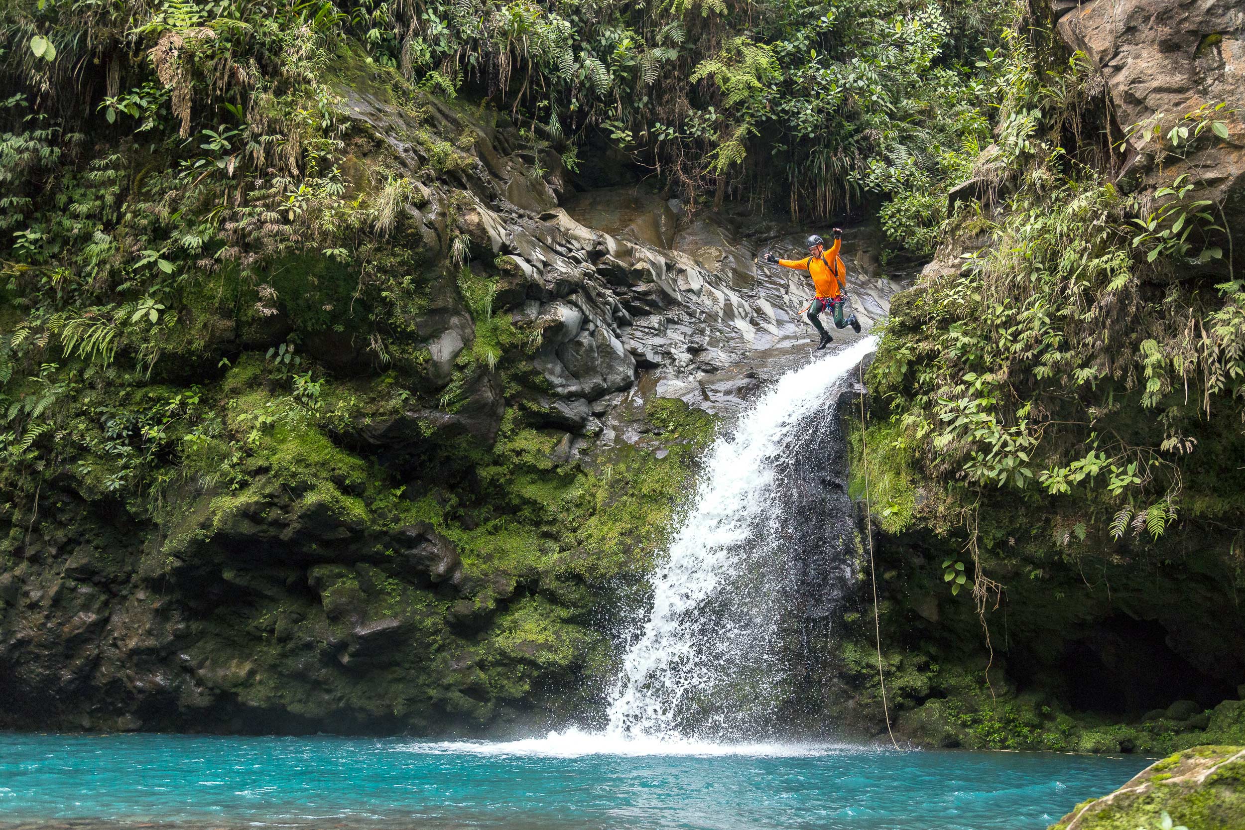 Scott jumps into one of the many emerald pools of Gata Fiera canyon. Photo: Victor Hugo Carvajal
